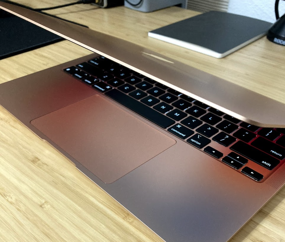 MacBook air in Gold sitting on my table